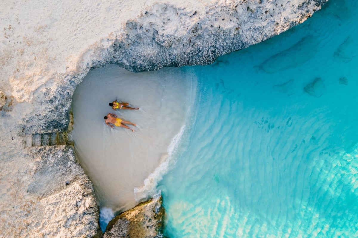 Couple on beach in Aruba