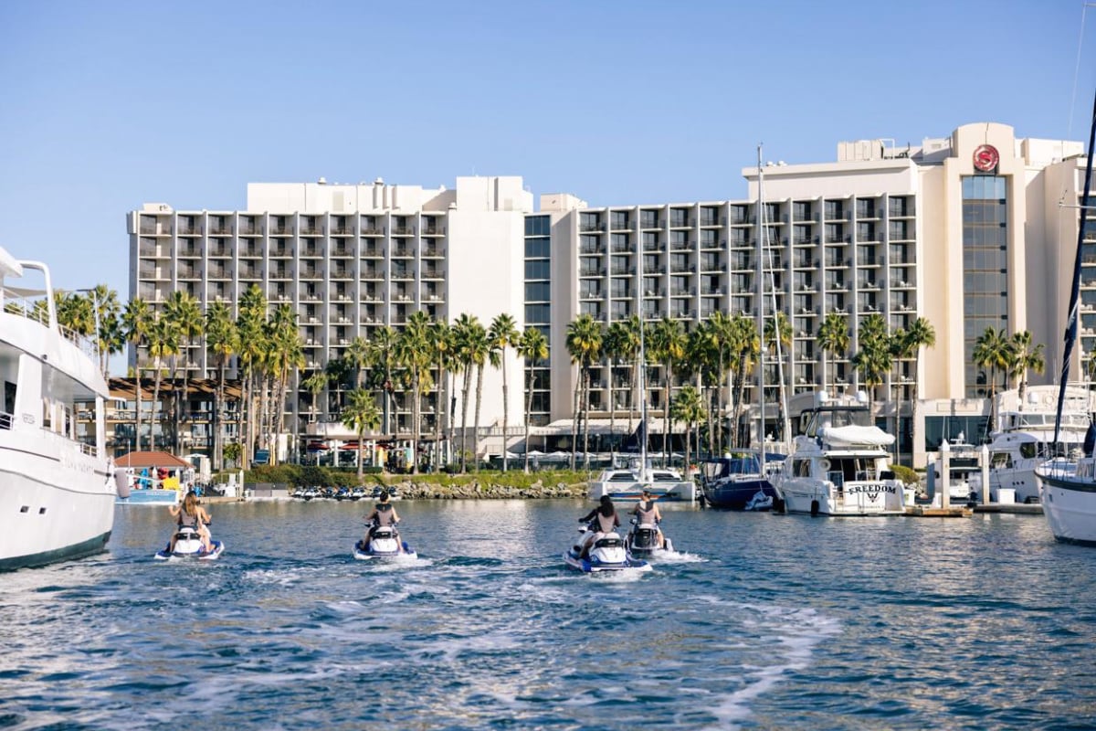 Jet skiers enjoying nice day outside Sheraton San Diego Hotel & Marina